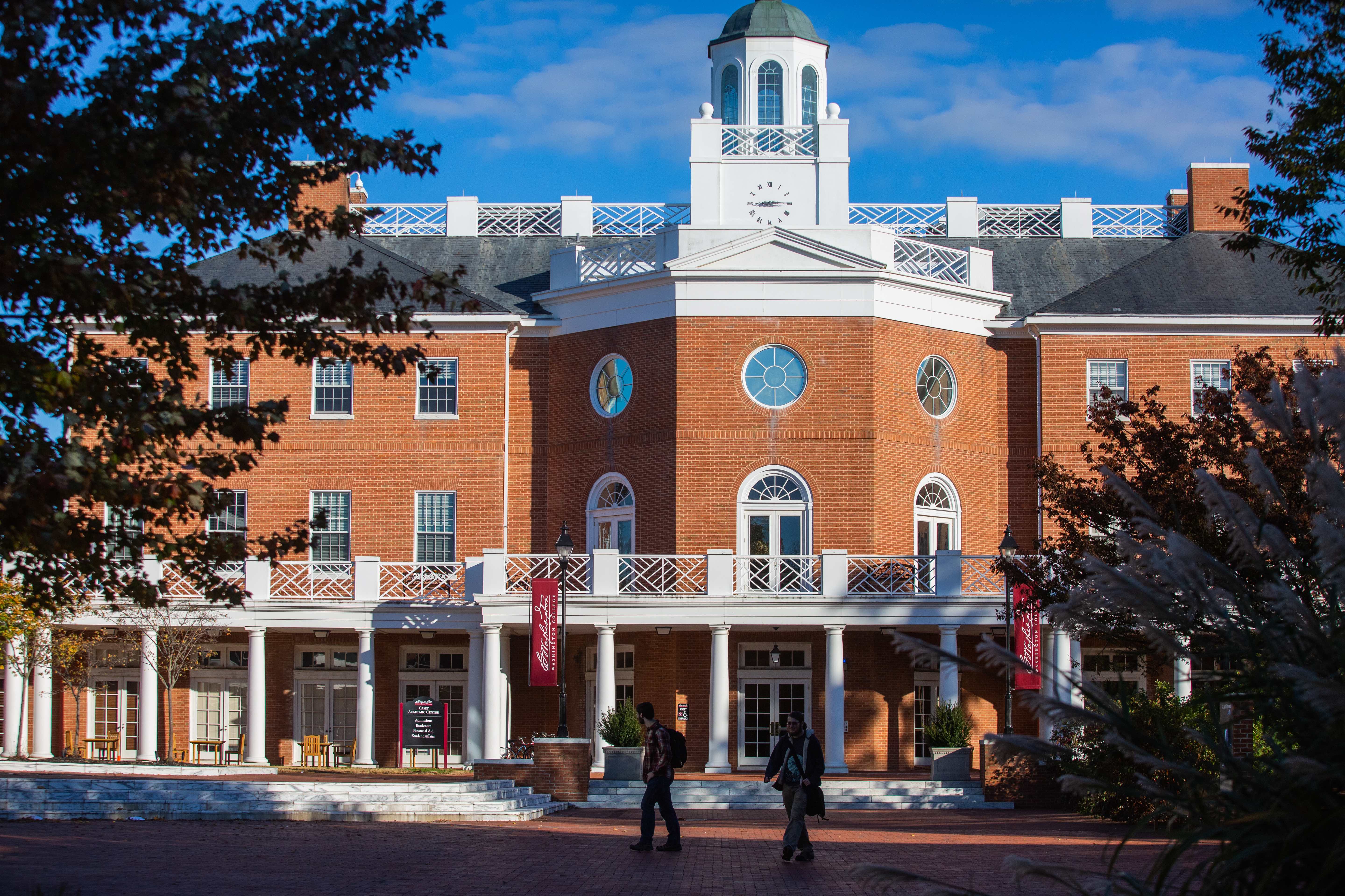 View of Casey Academic Center with students walking in front of it