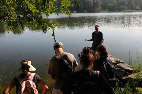 Naturalist Kathy Thornton discusses ecology along the Sassafras River during the Food Initiative's Permaculture Orientation program.