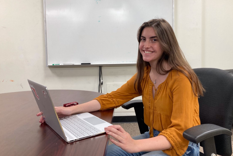 Anastasia Bekker '24 at her laptop