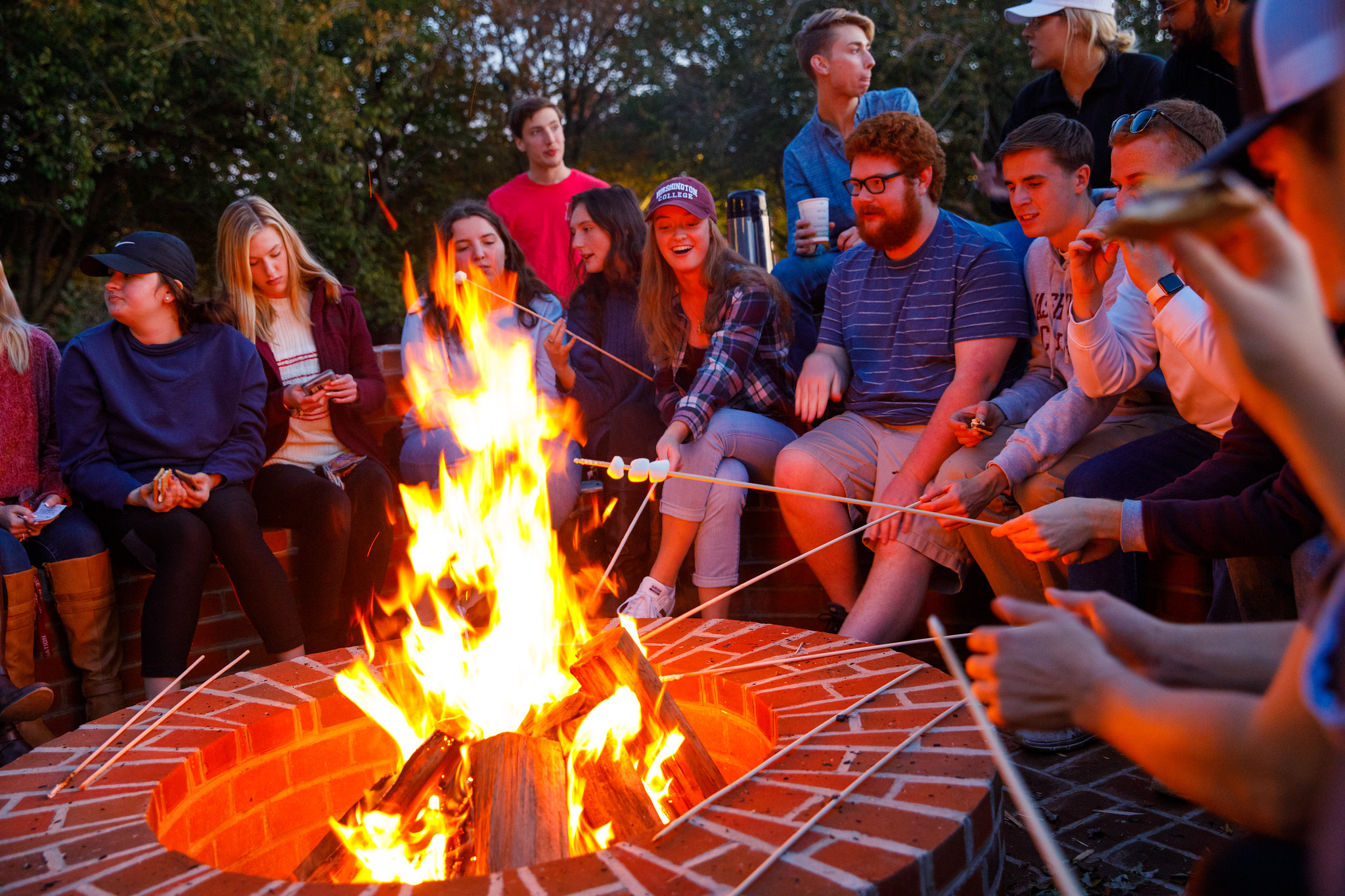 students roasting marshmellows