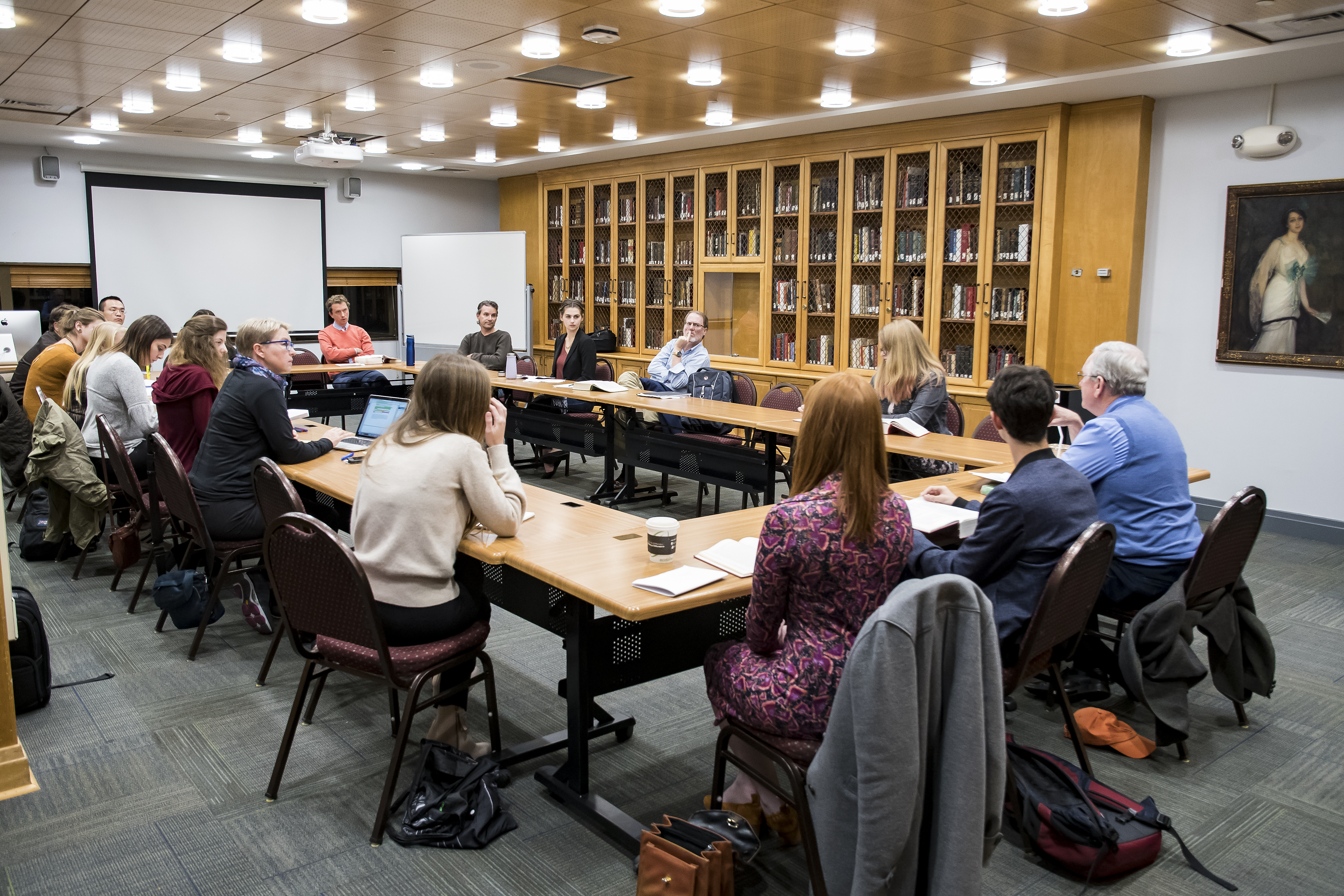 People sit around a conference table